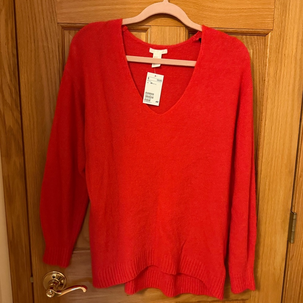 Brand new with tags H&M red v neck oversized sweater. Size XS